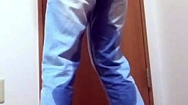 Girl soaks jeans peeing desperately while bro hogs the bathroom