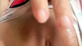 chica gets hot watching porno video on bed...