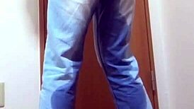 Girl soaks jeans peeing desperately while bro hogs the bathroom