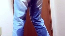 Girl soaks jeans peeing desperately while bro hogs the bathroom