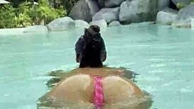 hot monika fox slips into her pink bikini, swims seductively in the pool then struts freely outdoors