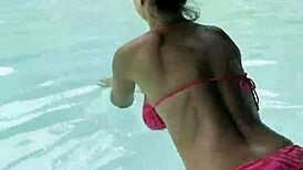 hot monika fox slips into her pink bikini, swims seductively in the pool then struts freely outdoors