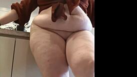 Half-sister flashes thong panties in kitchen, begs my stare