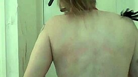 Slave kneels yielding to master's teasing oral urge
