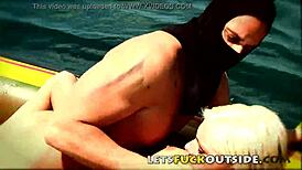 Fucking blonde chained in outdoor survival sex game on boat