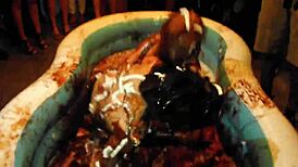 king dominates chocolate pool wrestling showdown