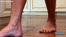 Suggestive Slip from Furry Slippers to Bare Toes in Kitchen