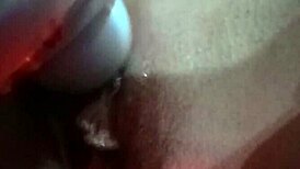 vibrator buzzing right on her wet shaved pussy lips