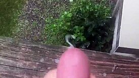 guy jerks off solo cumshot outdoors in wild public spot