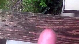 guy jerks off solo cumshot outdoors in wild public spot