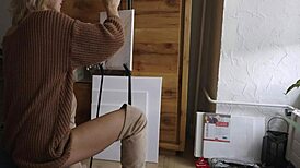 damn this sexy blonde babe paints her pretty pussy flower with glasses on