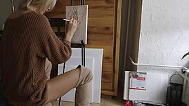 damn this sexy blonde babe paints her pretty pussy flower with glasses on