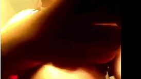 in the webcam glow a beautiful brunette fondles licks and bounces her huge tits teasingly