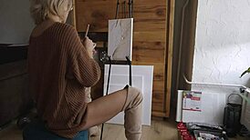 damn this sexy blonde babe paints her pretty pussy flower with glasses on