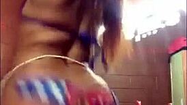 Ebony girl shakes and twerks her massive black ass in rhythmic dance moves