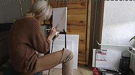 damn this sexy blonde babe paints her pretty pussy flower with glasses on