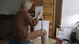 damn this sexy blonde babe paints her pretty pussy flower with glasses on