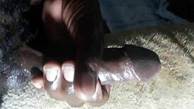 kenya's huge black cock handjob erupts closeup