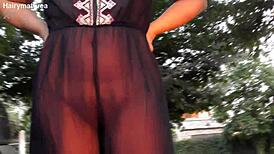 😏 ever seen a hairy mature flash her fat pussy outdoors? see through tease!