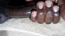 kenya's huge black cock handjob erupts closeup