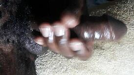 kenya's huge black cock handjob erupts closeup