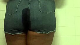 Young black chubby teen pees stream then farts hugely in bathroom closeup