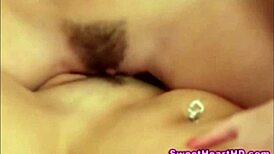 lesbian cuties grind wet pussies together in horny scissoring tribbing frenzy