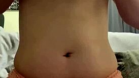 Amateur stuffs panties in her wet pierced pussy