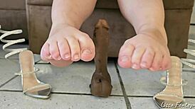 goddess uses her feet for a perfect footjob cum