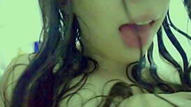 Just a cute student enjoying herself at the shower wet hair wet pussy mouth watering horniest as fuck
