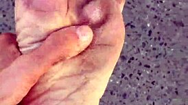 dirty calloused soles on display