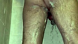 im taking a shower with a chastity belt on my penis