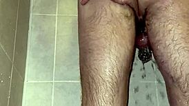im taking a shower with a chastity belt on my penis