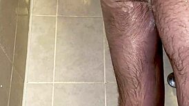 im taking a shower with a chastity belt on my penis