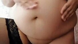 Pregnant wife masturbates her shaved pussy
