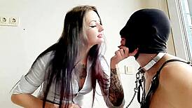 Dominatrix Nika kisses slave then slaps cheeks