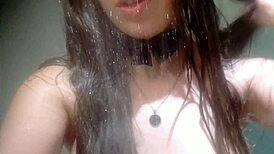 hot teen 18+ taking shower wearing a white lingerie