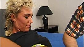 Underage girl demonstrates her uncovered tities in sexually suggestive sexual posiiton